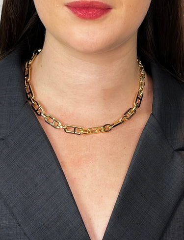 Model wearing Adeline Necklace by Matte, gold plated rectangular link chain