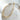 Adeline gold plated rectangular link chain necklace draped on ceramic vase