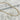 Albacete Necklace by Matte, gold plated chain necklace displayed on marble tile background