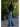 Amit Top black fitted long sleeve turtleneck crop top styled with denim, body-hugging silhouette outdoors.