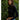 Amit Top black turtleneck fitted crop top side view showing long sleeves and sculpted fit