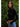 Amit Top black turtleneck fitted crop top side view showing long sleeves and sculpted fit