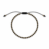 Amurk Bracelet featuring polished black round beads with gold-tone accent beads on an adjustable black sliding cord closure.