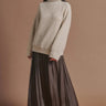Front view of the Annie chocolate brown pleated maxi skirt.