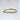 Antioca bracelet by Matte, gold filled tennis bracelet with round clear stones on white background