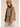 Side profile of the Aspen Utility Jacket showing the oversized fit, utility styling, long sleeves, and relaxed drape.