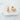 Azzura stud earrings by Matte, gold plated minimalist oval design on white stone background, hypoallergenic nickel-free