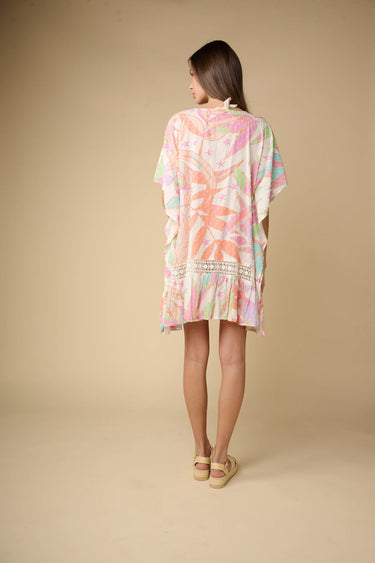 Back view of Irvine Tunic showing relaxed fit and lightweight pastel fabric.