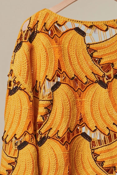 Banana Bloom Crochet Top close-up of open-knit crochet fabric with banana-inspired pattern and textured detailing.