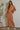 Barbara Top oversized waffle knit cap sleeve top in terracotta styled with matching maxi skirt.