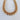 A gold-plated bold chunky chain necklace on a white background.