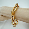 Betsy chunky gold chain bracelet on wooden display – Matte jewelry