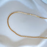 Bilbao gold chain necklace by Matte displayed on white background, delicate everyday jewelry