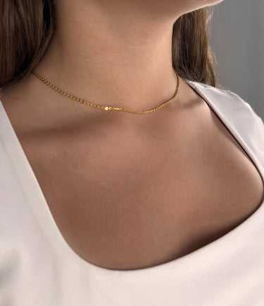 Model wearing Bilbao gold plated chain necklace by Matte, classic minimalist style