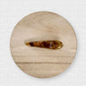 Bobby Hair Clip in carey resin on light wood background, by Matte.