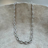 Bolena necklace by Matte, gold plated chain necklace with 17" length and 3" extender on marble background