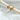 Side angle of Braine Hoop Earrings showing the crystal’s raised bezel setting on the hoop