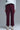 Full front view of Burgundy Wide-Leg Pants in burgundy with relaxed wide-leg cut.