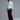 Model in Burgundy Wide-Leg Pants, styled with gray sweater and sneakers for a casual chic look.