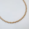 Caeli gold plated geometric chain necklace on white background