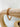 Calyn chunky gold chain bracelet on wooden display – Matte jewelry