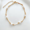 Gold chain Calypsa Bracelet with delicate pearl accents by Matte