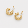 Caroline Hoop Earrings featuring polished gold-plated chunky hoop earrings with a textured ribbed finish, rounded silhouette, mirror shine, secure post-back closure, lightweight design, and bold everyday style.
