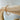 Cassidy gold chain bracelet on wooden display – minimalist Matte jewelry