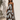 Celani Maxi Dress strapless brown floral maxi dress with oversized cream floral print worn on model showing full length flowy silhouette.