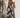 Celani Maxi Dress back view strapless maxi dress with relaxed drape and bold floral print for resort styling.