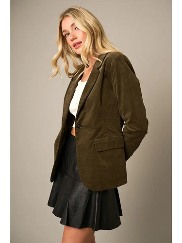 Three-quarter side view of the Cloe Corduroy Blazer Jacket showcasing the structured tailored fit, olive corduroy texture, long sleeves, and polished everyday styling.