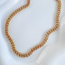 Cocothy necklace by Matte, gold plated chunky Cuban chain on white background