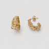 Conte Hoop Earrings featuring polished gold-plated hoop earrings with an organic crinkled texture, sculptural rounded hoop silhouette, high-shine finish, secure hinged closure, lightweight design, and bold everyday statement style.