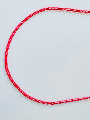 Crescent Necklace in pink enamel and gold plated chain by Matte, modern colorful jewelry
