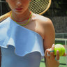 Model wearing Crescent yellow enamel gold plated chain necklace by Matte, sporty summer jewelry