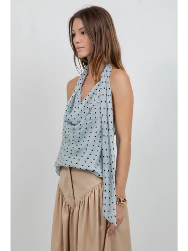 Side view of the Cristine halter top with adjustable scarf tie.