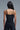 Back view of Crystal Embellished Corset Top in black with adjustable straps.