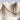 Dalia necklace silver plated heart charm chain on textured beige background