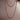 Devan beaded necklace by Matte, long gold and red beaded necklace, styled layered on neutral background