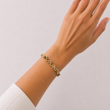 Efi Bracelet in earthy tones featuring alternating polished beads on a fine adjustable chain.