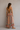 Full-body back view of the Eloisa floral tiered maxi dress showcasing the colorful vintage-inspired floral print and relaxed fit.