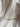 Encanto gold plated chain necklace by Matte, delicate flat chain on neutral fabric
