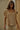 Etta Blouse silky sand beige flutter sleeve blouse with relaxed draped silhouette worn on model.