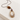 Fevi Necklace featuring a sculptural cream and brown teardrop resin pendant on a dark cord.