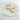 14K gold-plated twisted hoop earrings with scalloped texture and high-shine finish. Small and elegant for everyday wear.
