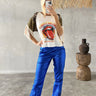 Close-up of Stones Pant showing mid waist and flared leg in electric blue.