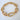 Gold oval link bracelet with polished finish and cubic zirconia accents on clasp link