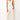 front view of woman wearing Golden Star Wide-Leg Pants, ivory fabric with gold star embroidery, high waist, relaxed fit