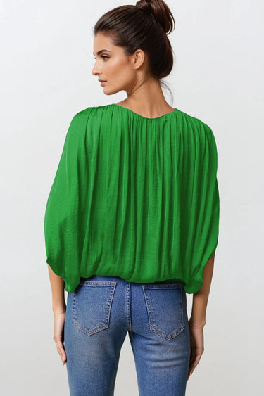 Kyoto blouse in green, back view.