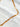 Halo Necklace by Matte, gold filled rectangular link chain on white marble surface